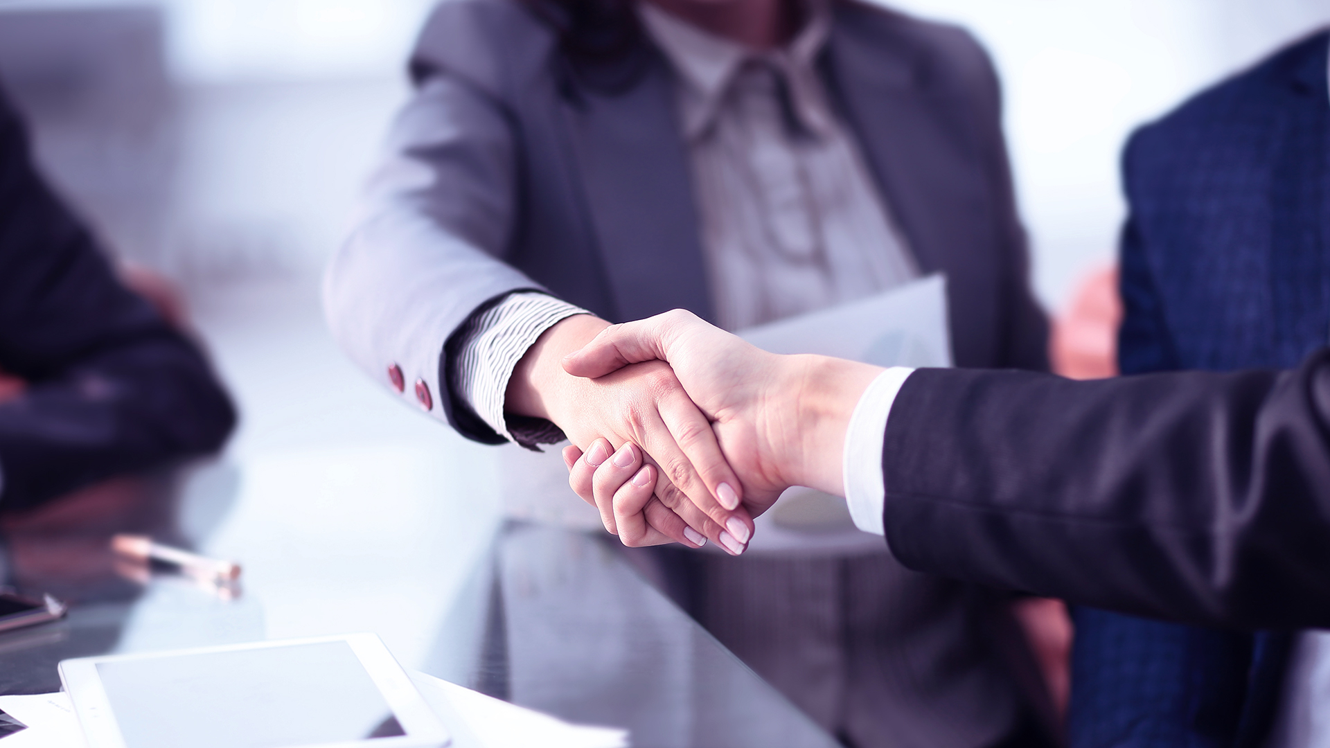 Business handshake sealing a commercial kitchen project agreement